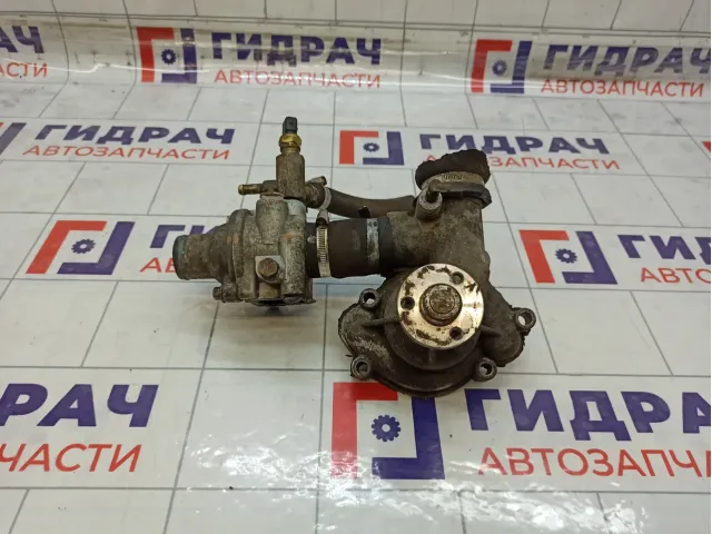 Корпус термостата с помпой UAZ Profi