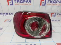 Фонарь задний наружный левый Volkswagen Golf Plus (Mk5) 5M0945095S. Мелкие царапины.