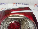 Фонарь задний наружный левый Volkswagen Golf Plus (Mk5) 5M0945095S. Мелкие царапины.