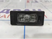 Фонарь подсветки номера Volkswagen Polo Sedan (Mk5) 5NA943021.