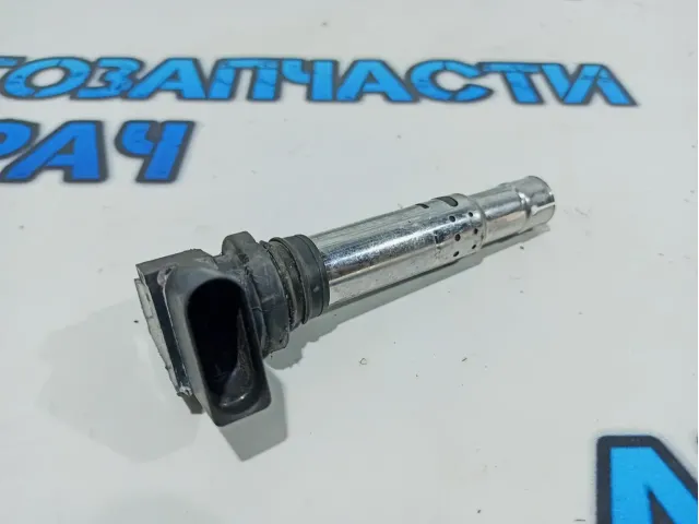 Катушка зажигания Volkswagen Tiguan.