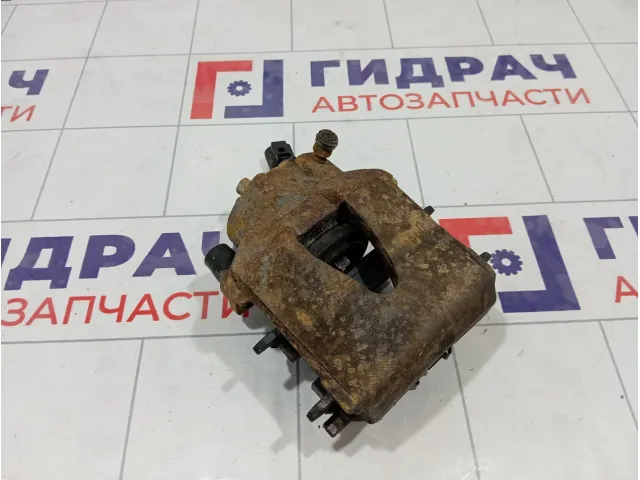 Суппорт тормозной передний левый Volkswagen Jetta 1K0615123D