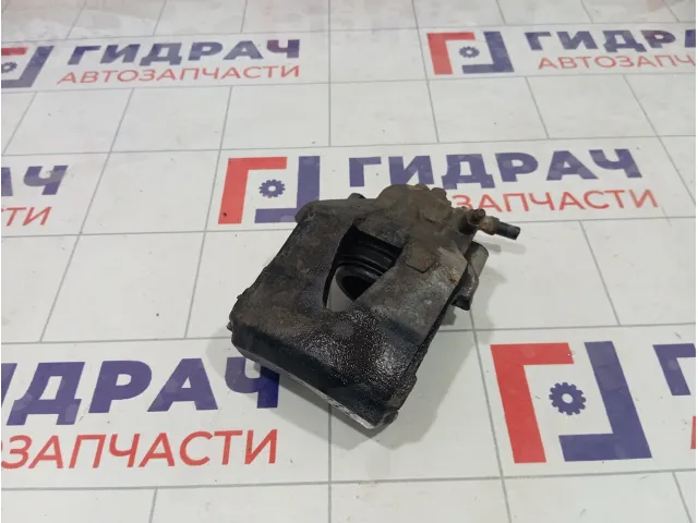 Суппорт тормозной передний левый Volkswagen Polo 1K0615123D