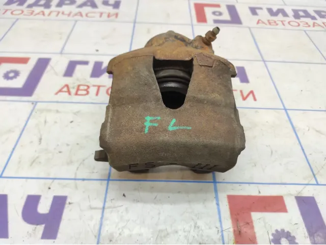 Суппорт тормозной передний левый Volkswagen Polo Sedan (Mk5) 1K0615123D.