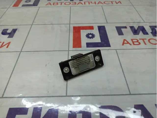 Фонарь подсветки номера Volkswagen Tiguan 1J5943021D