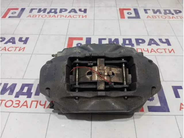 Суппорт тормозной передний правый Volkswagen Touareg 7L6615124R