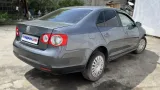 Петля багажника левая Volkswagen Jetta V 1K5827301A