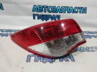 Фонарь задний наружный левый Nissan Almera G15 265594AA0A. Удовлетворительное состояние. Трещины.