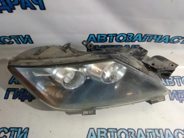 Фара правая Mazda CX-7 EH1051031A.