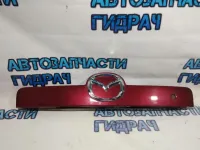 Накладка двери багажника Mazda CX-7 EG2450810E88 .