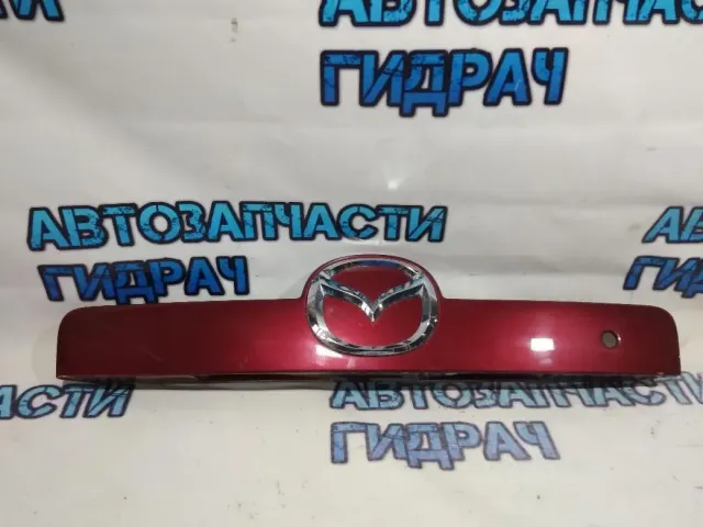 Накладка двери багажника Mazda CX-7 EG2450810E88 .