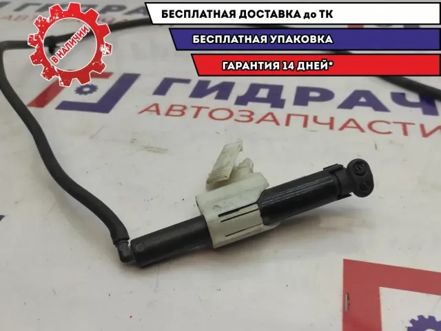 Форсунка омывателя фары правая Ford Mondeo IV 7S7113L014AA.