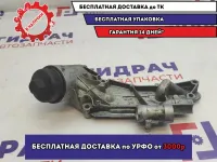 Корпус масляного фильтра Chevrolet Cruze 55353323.