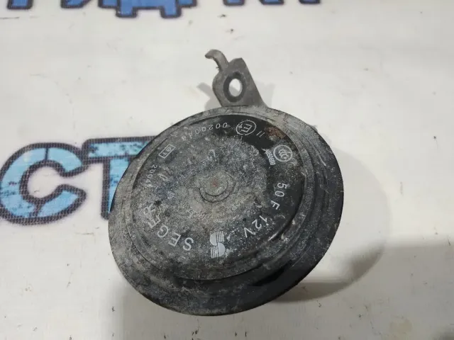 Сигнал звуковой Nissan Terrano 3 256103347R. Низкий тон.