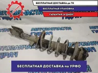 Амортизатор передний левый Nissan Terrano 3.