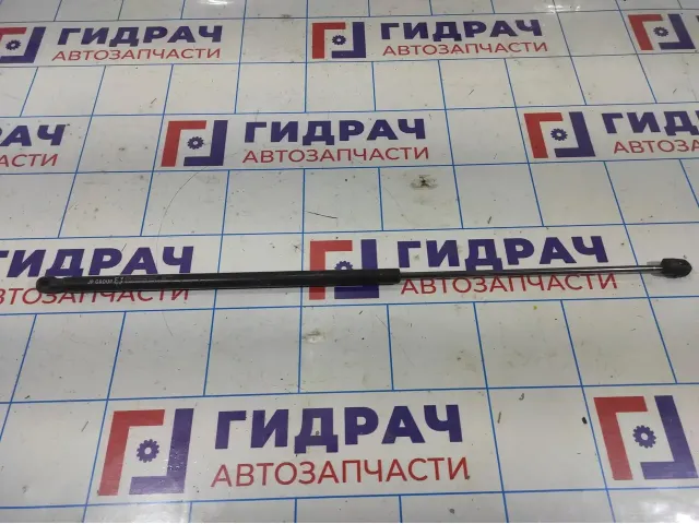 Амортизатор капота Skoda Superb.