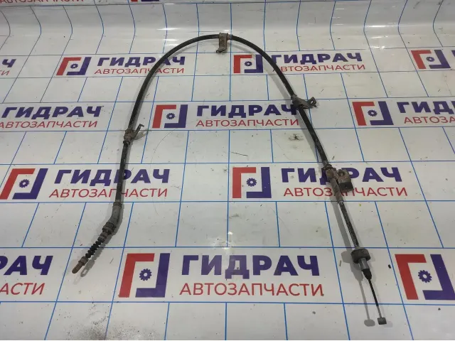 Трос стояночного тормоза левый Hyundai Elantra HD.