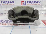 Суппорт тормозной передний правый Toyota Corolla E150. Сломан штуцер. 4773012A10